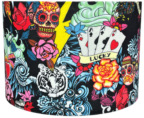 Vintage tattoo lampshade featuring sugar skulls, anchors, and roses design.