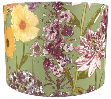 Sage green lampshade featuring wildflower floral design with pink and white flowers.