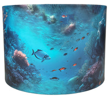 Load image into Gallery viewer, Ocean-themed lampshade with vibrant sea creatures, including fish and jellyfish, on a soothing blue backdrop