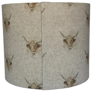 Highland Cow print lampshade, a stylish accessory for home lighting.