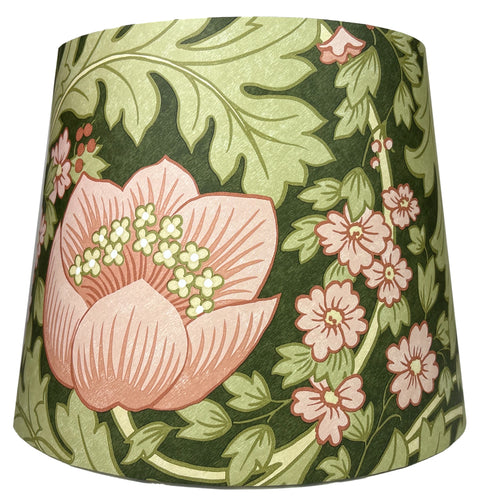 Arts and Crafts style lampshade with pink flowers and green leaves.