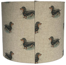 Load image into Gallery viewer, Handcrafted linen lampshade with dachshund motifs, ideal for ceiling pendants or table lamp bases