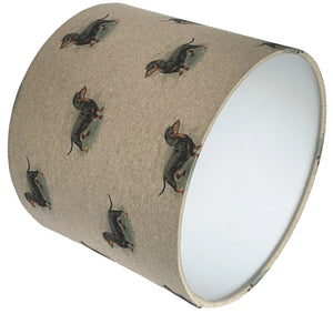 Beige sausage dog lampshade made of linen material, perfect for adding a classic touch to any room.