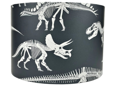 Kids dinosaur lampshade featuring a fun prehistoric design.